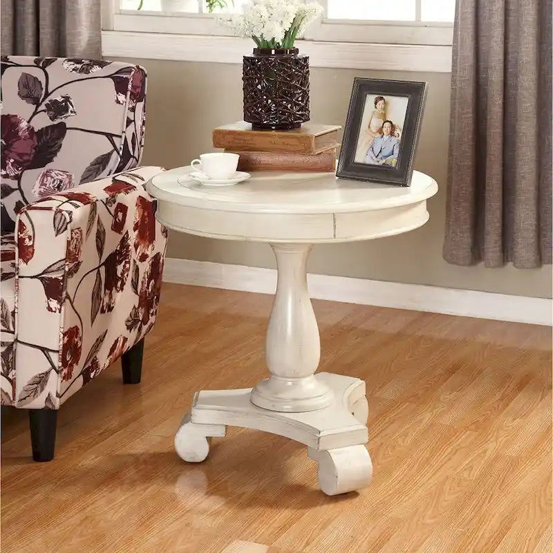 Petite table d'appoint ronde en bois avec pieds sculptés