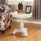 Petite table d'appoint ronde en bois avec pieds sculptés