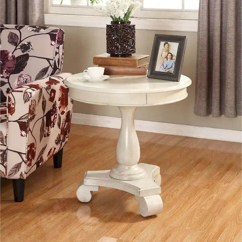 Petite table d'appoint ronde en bois avec pieds sculptés