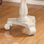 Petite table d'appoint ronde en bois avec pieds sculptés