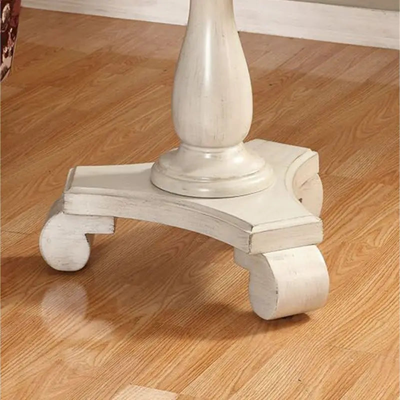 Petite table d'appoint ronde en bois avec pieds sculptés