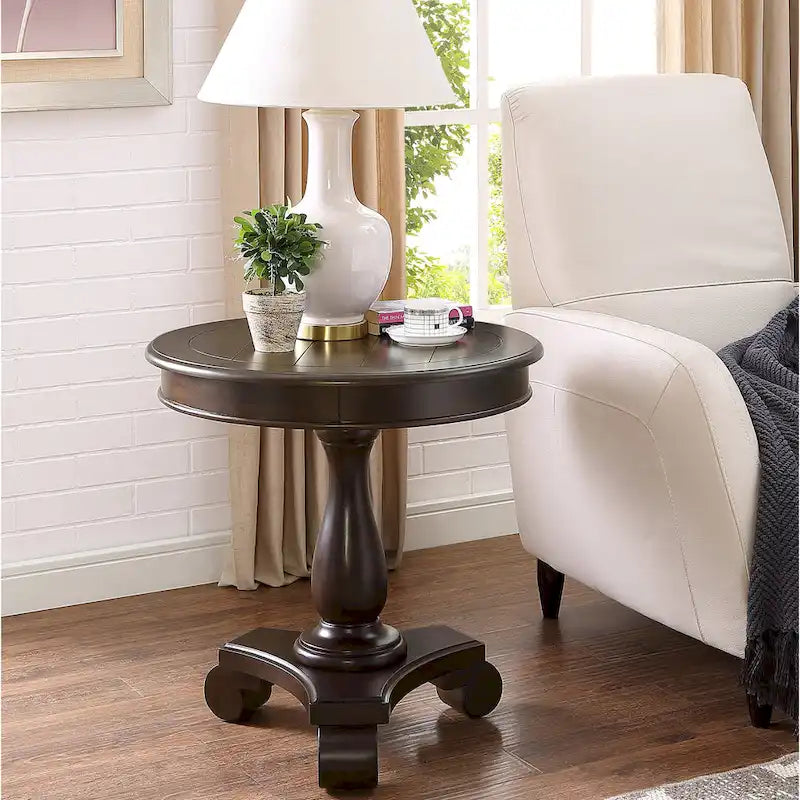 Petite table d'appoint ronde en bois avec pieds sculptés