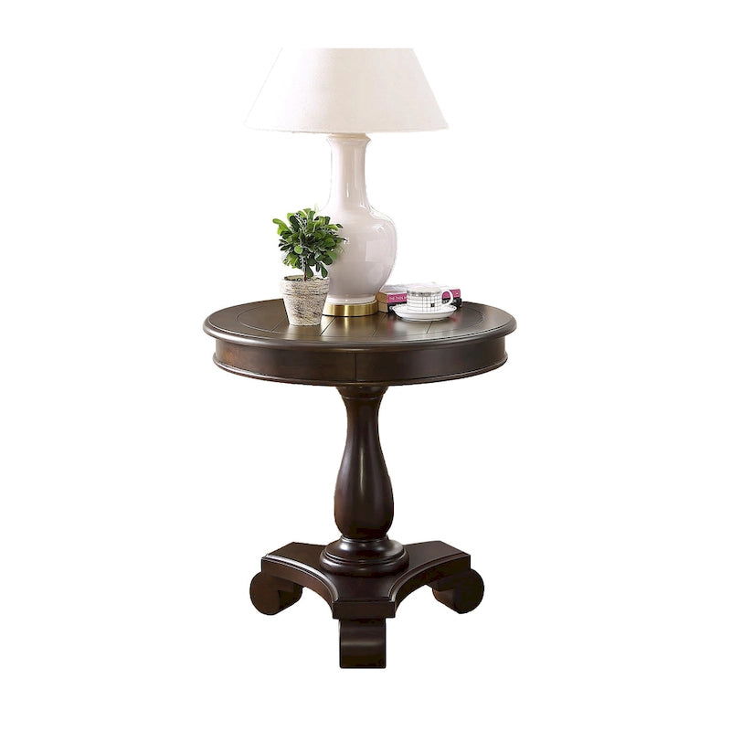 Petite table d'appoint ronde en bois avec pieds sculptés