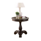 Petite table d'appoint ronde en bois avec pieds sculptés