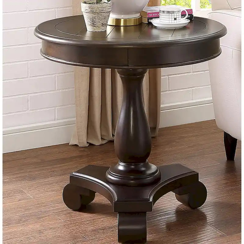 Petite table d'appoint ronde en bois avec pieds sculptés