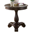 Petite table d'appoint ronde en bois avec pieds sculptés