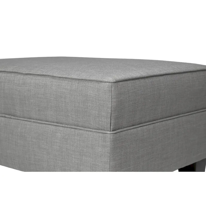 Ottoman capitonné en tissu carré avec passepoil
