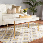 Table basse Glam en métal doré brossé et bois à finition blanche